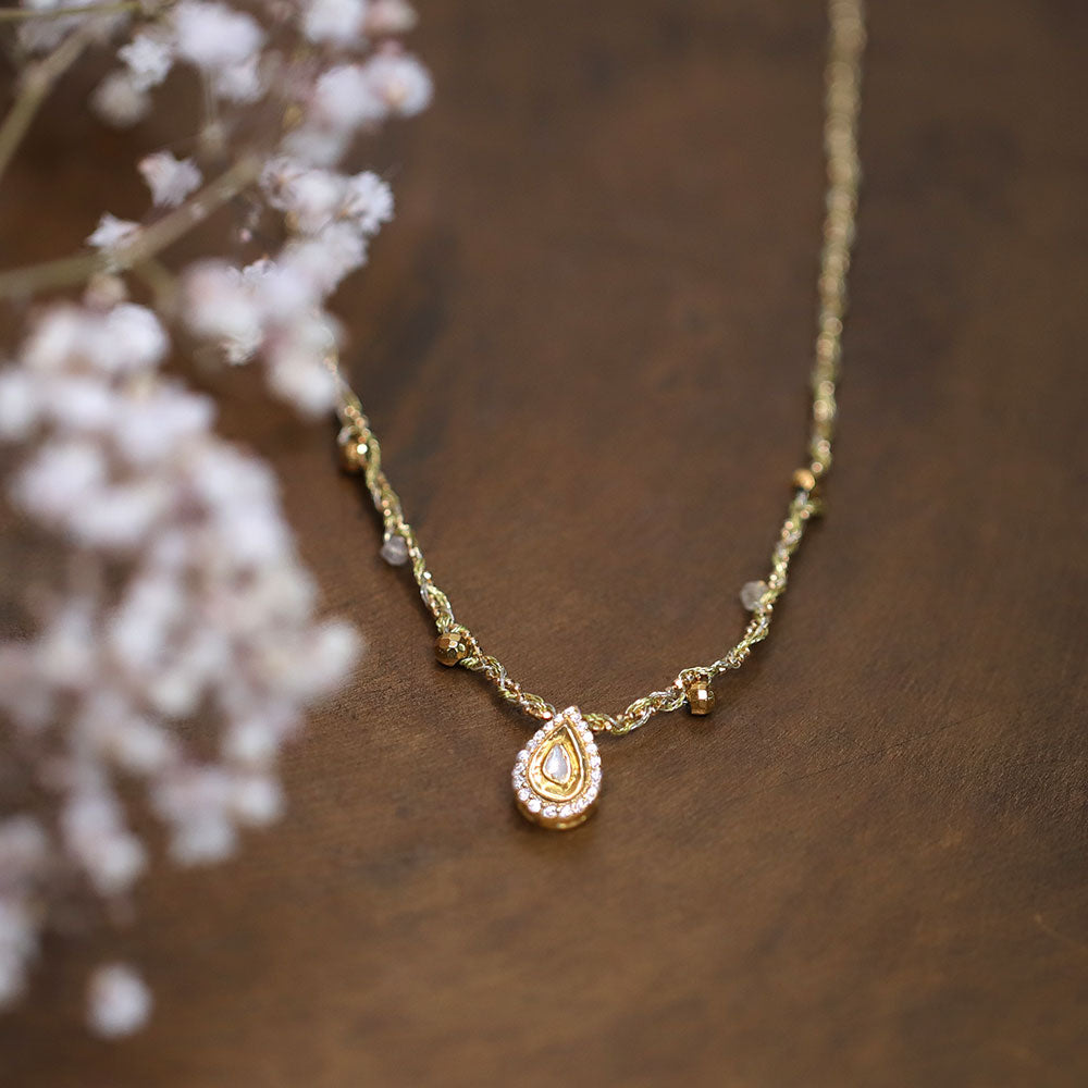 Polki diamond pendant braided necklace
