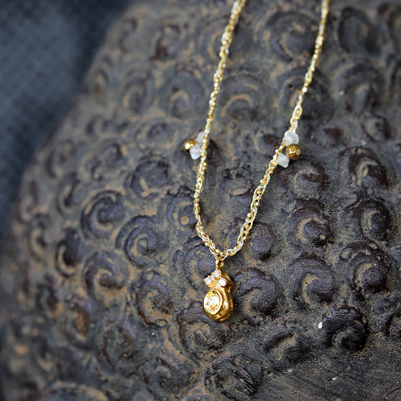 Braided necklace with polki diamond pendant