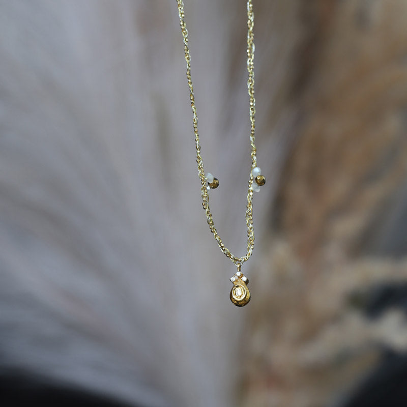Braided necklace with polki diamond pendant